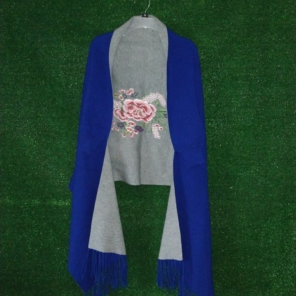 Unbranded shawl with a floral embroidery on it